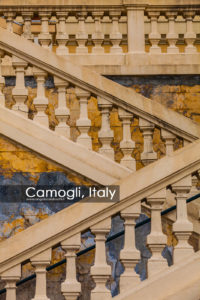 Ancient marble staircase, antique wall. Italy. Geometric background, perspective.