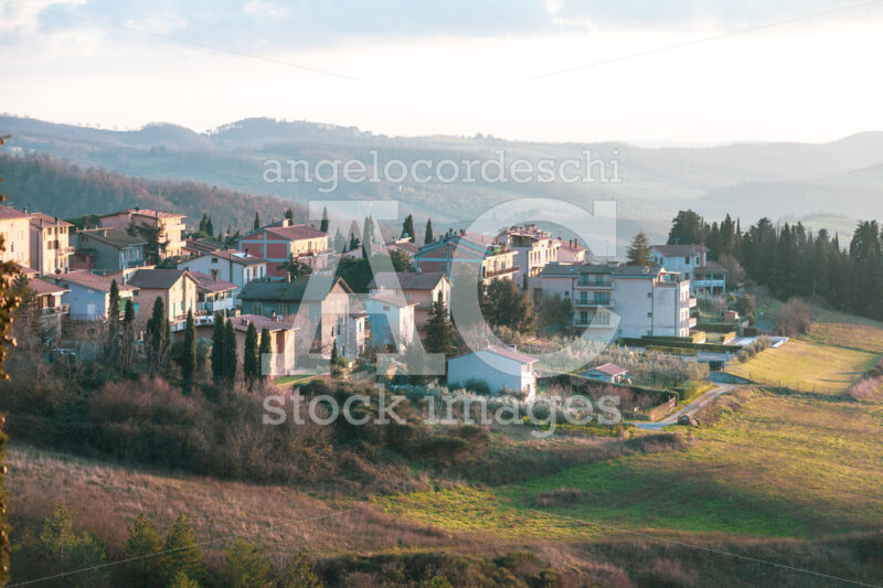 Aerial view of a small Italian village in Tuscany. Hills nature. - Angelo Cordeschi