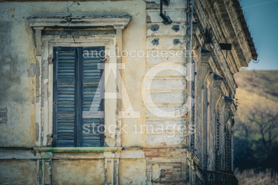 Architectural Detail Of An Ancient House With Window With Green Angelo Cordeschi