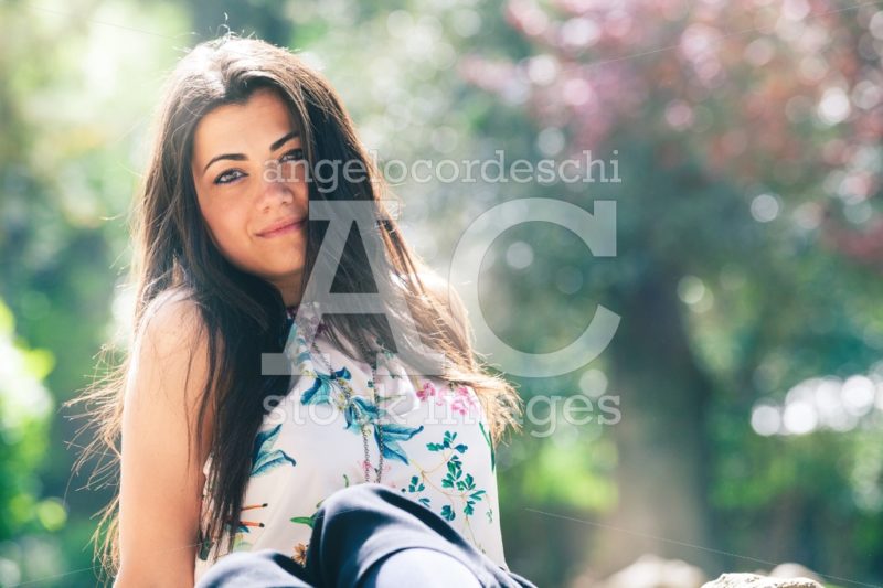 Beautiful And Young Happy Woman Outdoors In Spring Season. Glowi Angelo Cordeschi