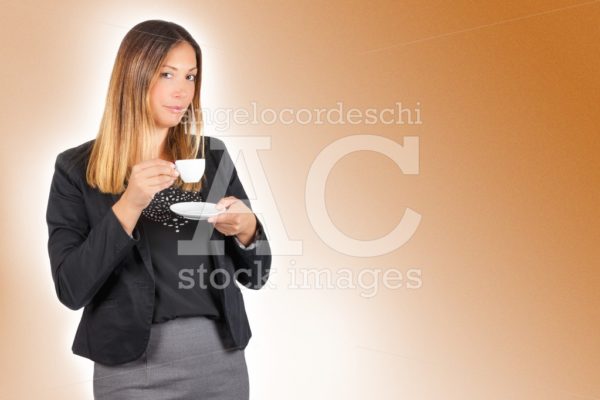 Business woman drinking coffee in cup. Work pause. - Angelo Cordeschi