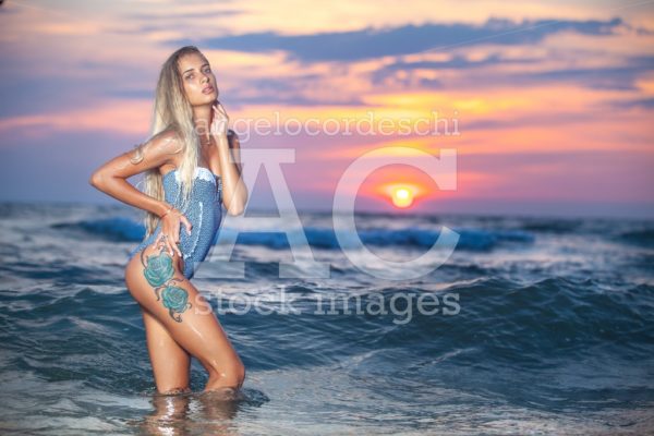 Colorful Sea Sunset With Sensual And Seductive Beautiful Woman W Angelo Cordeschi