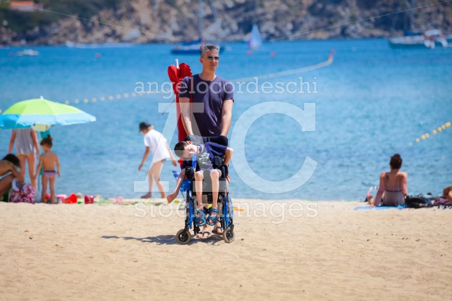 Elba Island, Italy. June 25, 2016: Young Disabled Boy In The Whe Angelo Cordeschi