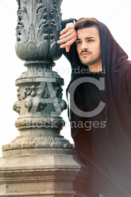 Gorgeous Young Man Leaning Against A Old Streetlight Lamppost. H Angelo Cordeschi