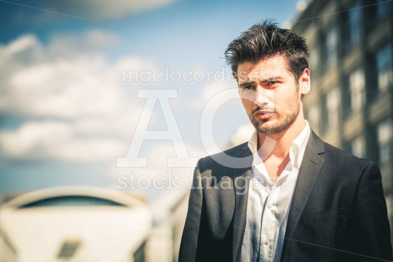 Handsome man outdoor with suit and white shirt. - Angelo Cordeschi