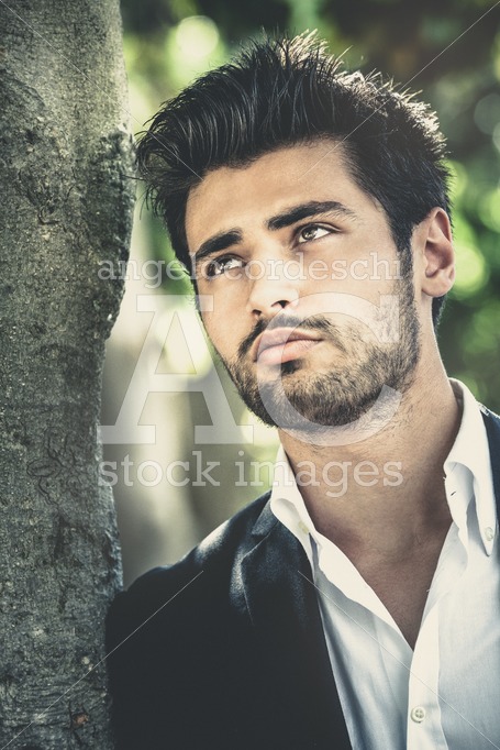 Handsome man, portrait of young man with stubble beard. - Angelo Cordeschi