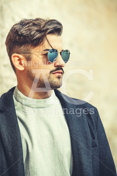 Handsome Stylish Man With Sunglasses And Modern Hairstyle And Be Angelo Cordeschi
