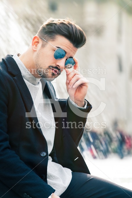Handsome Stylish Man With Sunglasses And Modern Hairstyle And Be Angelo Cordeschi