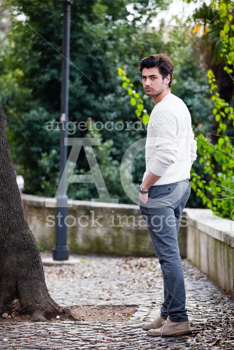 Handsome Young Man Outdoor In The Street With Hands In The Pocke Angelo Cordeschi