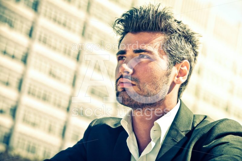 Handsome young man outdoor. Stubble and hairstyle. - Angelo Cordeschi