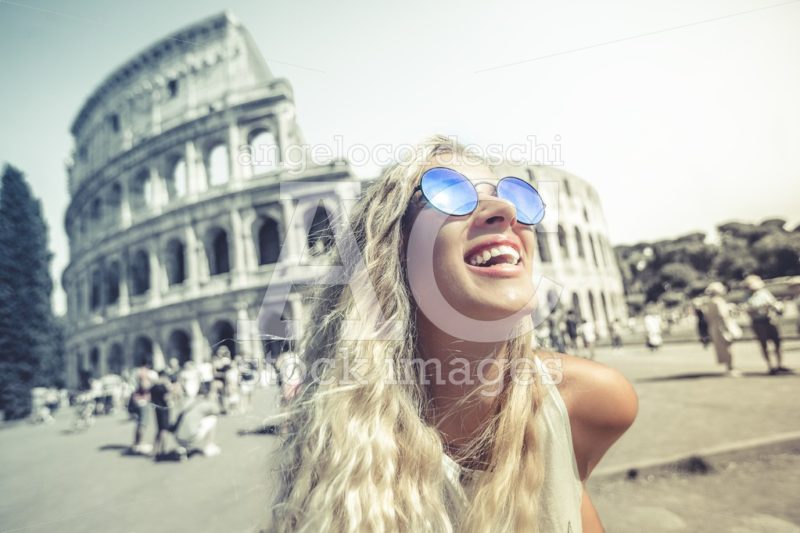 Happy Holidays In Rome, Smiling Young Blonde In Front Of Colosse Angelo Cordeschi