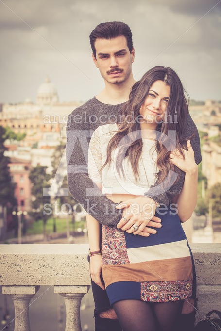 Holiday In Rome. Beautiful Lovely Young Italian Couple Embracing Angelo Cordeschi