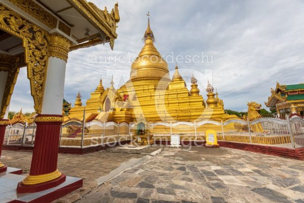 Kuthodaw Pagoda, golden yellow Buddhist religious structure in t - Angelo Cordeschi