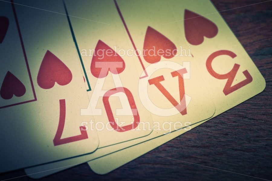Love, Poker Playing Cards With Heart Symbol That Form The Writte Angelo Cordeschi