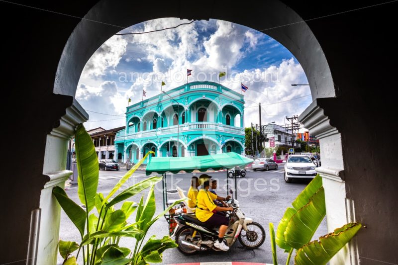 Old Town Of Phuket, Blue Building And City Life. View Inside An Angelo Cordeschi