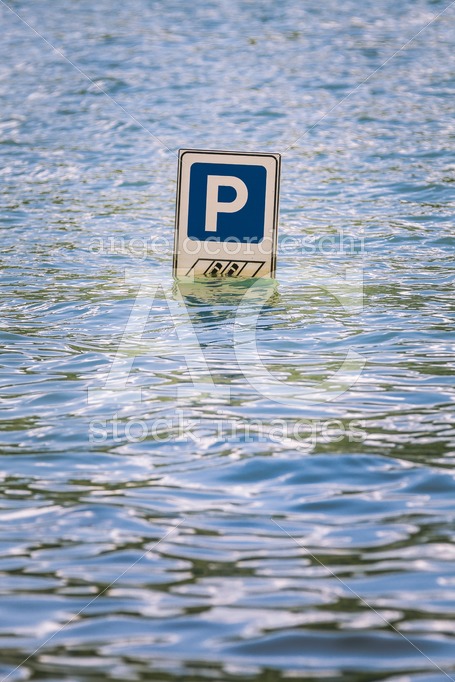 Parking Road Sign Partially Submerged In A Flood. Letter P Indic Angelo Cordeschi
