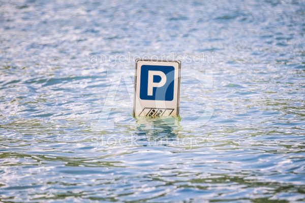 Parking Road Sign Partially Submerged In A Flood. Letter P Indic Angelo Cordeschi