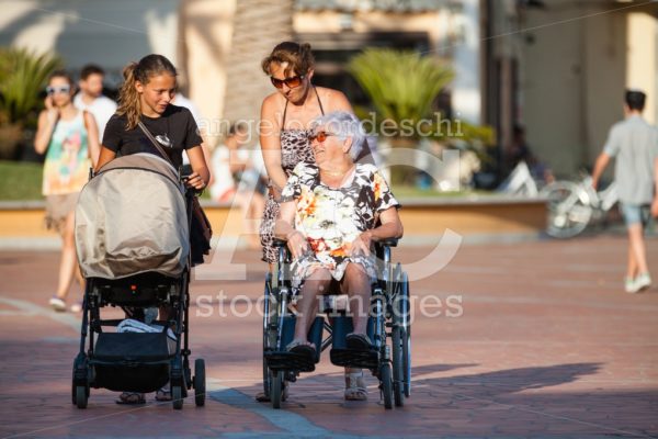 Porto Azzurro, Italy. June 26, 2016: Disabled With Wheelchair. W Angelo Cordeschi