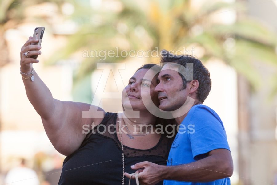 Porto Azzurro, Italy. June 26, 2016: Happy Couple Doing A Selfie Angelo Cordeschi