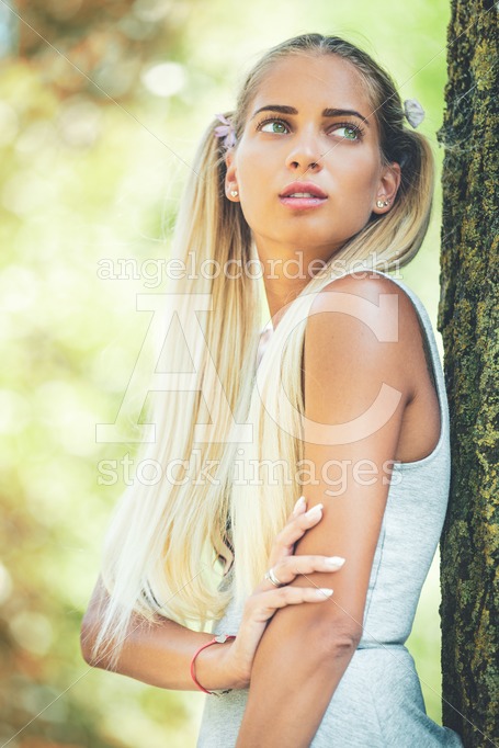 Portrait Of A Young Dreamer Woman In The Nature. Long Blond Hair Angelo Cordeschi