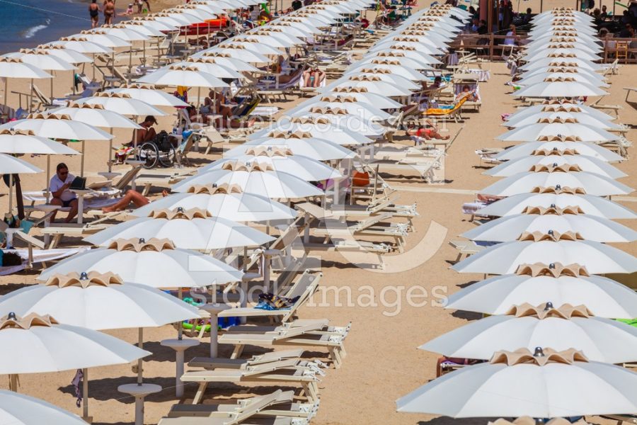 Procchio, Italy. June 28, 2016: Countless White Umbrellas. Socia Angelo Cordeschi