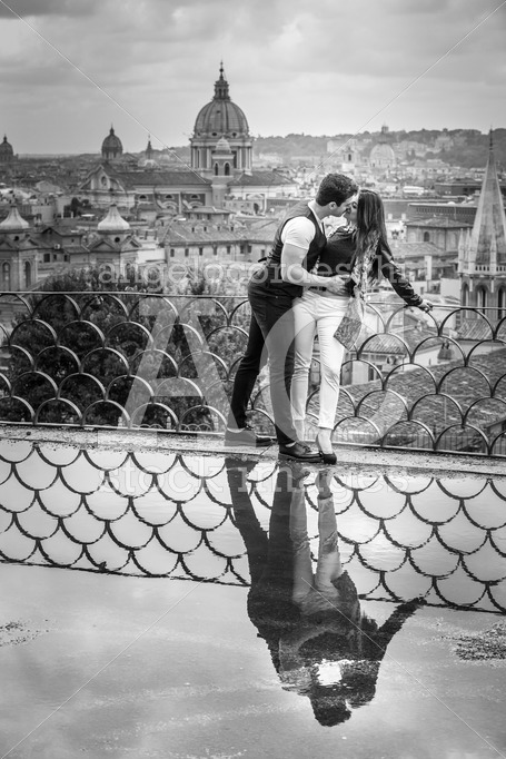 Romantic couple in Rome city, Italy. A beautiful pair embrace on - Angelo Cordeschi