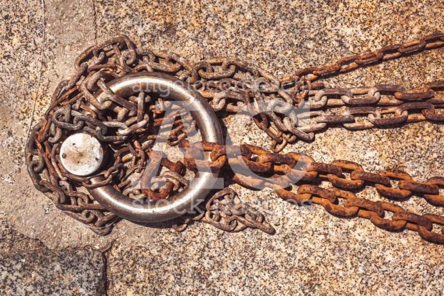 Rusty Steel Ring And Mooring Lines In A Seaport. Rusty Iron Chai Angelo Cordeschi