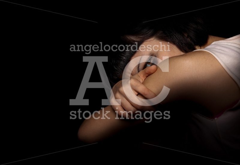 Sad Young Girl In The Shadows, Woman Curled Up On Her Legs And L Angelo Cordeschi