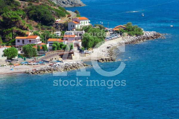 Sea Shore With Beach And Rocks And Rocky Slope Of The Island Of Angelo Cordeschi