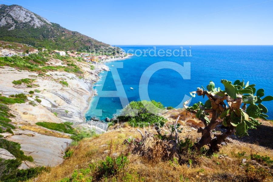 Seashore With Beach And Rocks And Rocky Slope Of The Island Of E Angelo Cordeschi