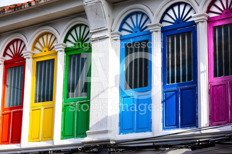 Six Colored Doors Or Windows Outside On The Facade Of An Ancient Angelo Cordeschi