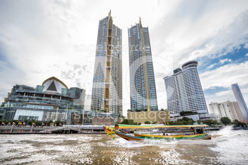 Skyscraper Buildings Seen From The Chao Phraya River In The Metr Angelo Cordeschi