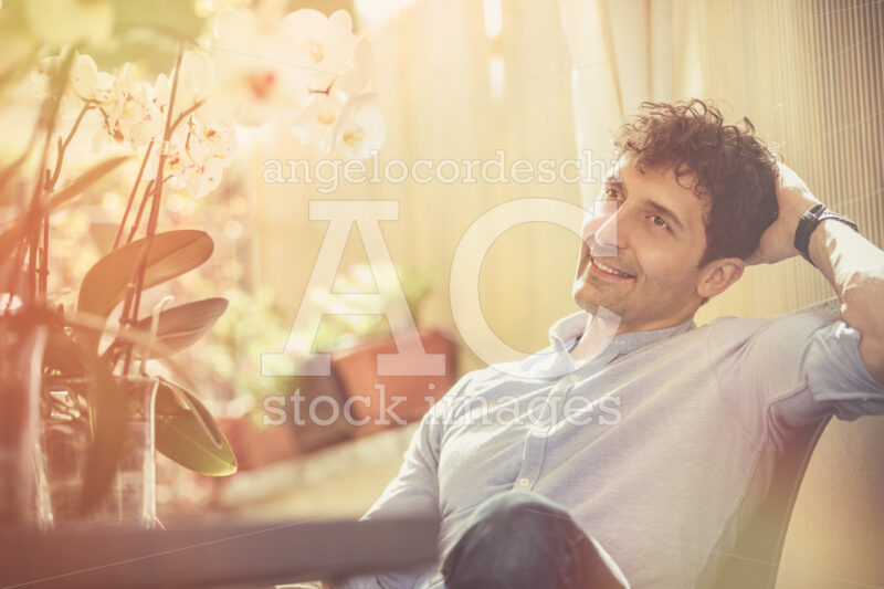 Smiling Joyful Man Sitting And Relaxed With Positive Attitude Ou Angelo Cordeschi