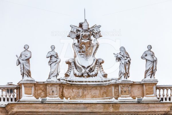 Snow Covered Statues On The Roof Of St. Peter`s Cathedral In Vat Angelo Cordeschi