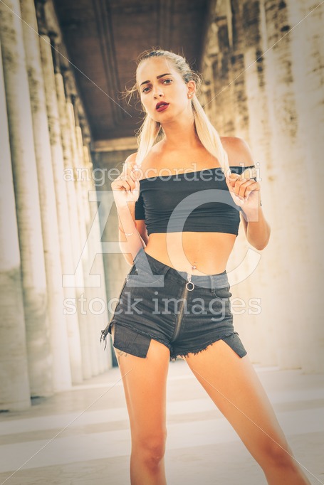 Stylish Young Woman, Posing Outdoors. Long Blond Hair. In The Ba Angelo Cordeschi