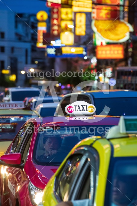 Taxis Lined Up In The China Town Area Of Bangkok Thailand. Neon Angelo Cordeschi