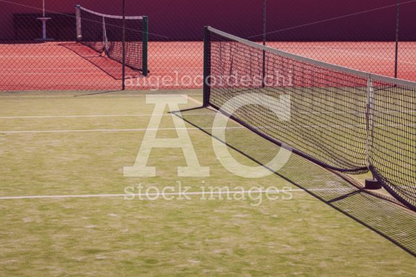 Tennis Courts, Green And Red Color. Tennis Net In Perspective. N Angelo Cordeschi