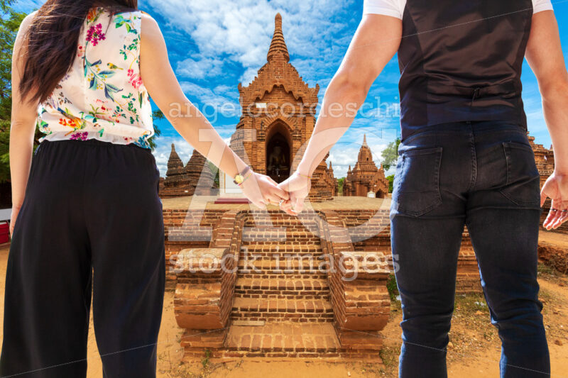 Travel In Burma. Engaged Couple Tourists Holding Hands In The A Angelo Cordeschi