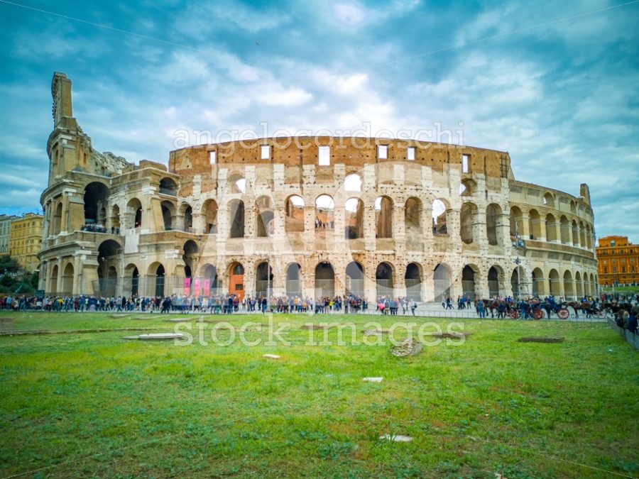 Whole Colosseum In Rome In Italy. Crowd Of Tourists People Along Angelo Cordeschi