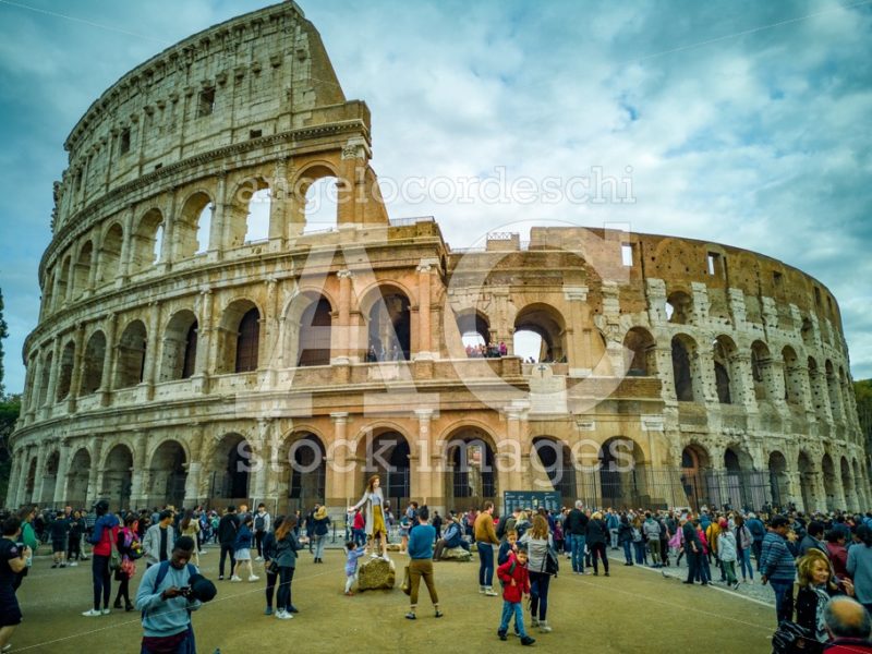 Whole Colosseum In Rome In Italy. Crowd Of Tourists People Along Angelo Cordeschi