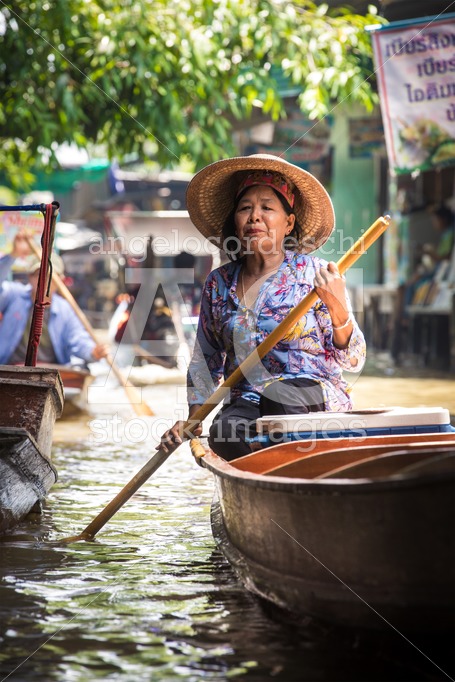 Woman With Small Boat In The Floating Market In The Damnoen Rive Angelo Cordeschi
