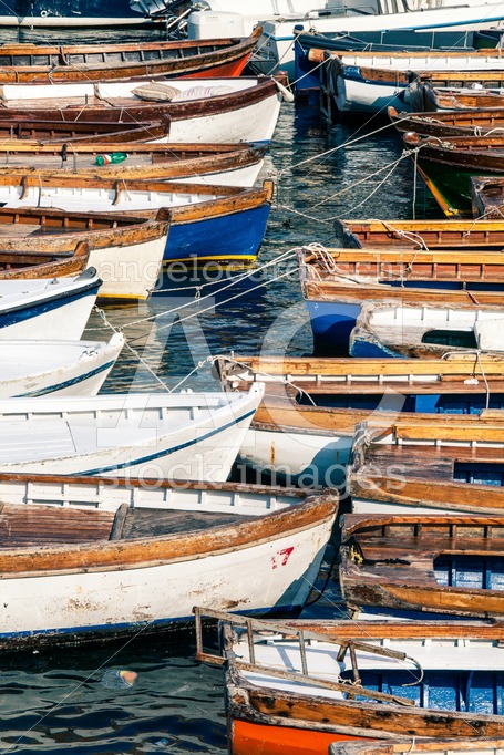 Wooden vintage boats. Countless fishing boats. - Angelo Cordeschi
