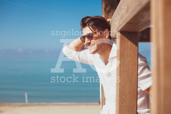 Young And Handsome Happy Man On Beach Vacation Angelo Cordeschi