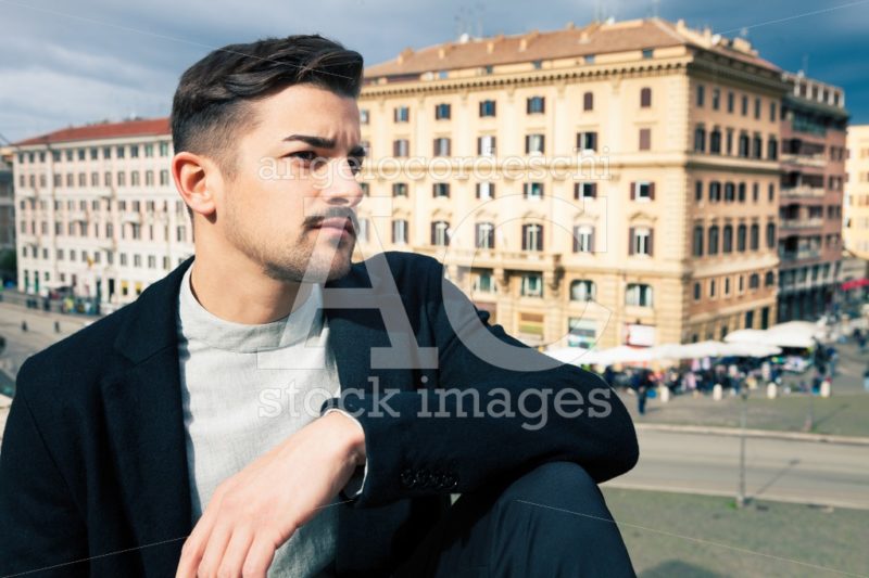 Young And Handsome Man Portrait. In The Street In The City Durin Angelo Cordeschi