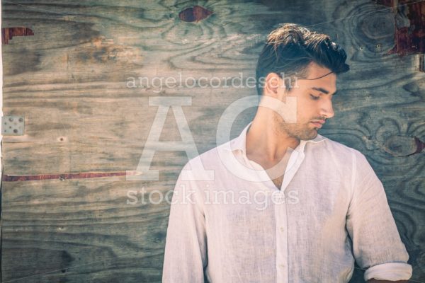 Young And Shy Man In Profile On Antique Wooden Background Angelo Cordeschi