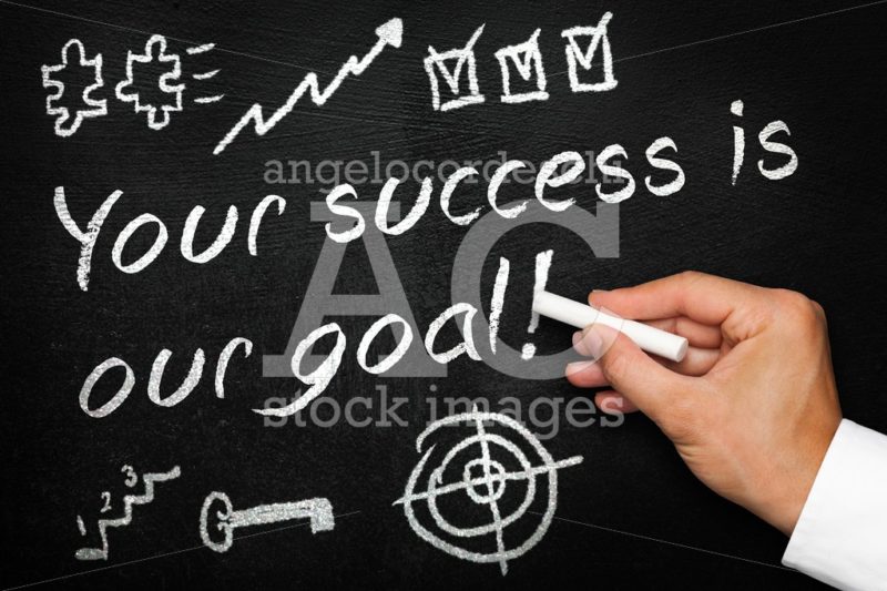 Your success is our goal. Blackboard or chalkboard with hand and - Angelo Cordeschi